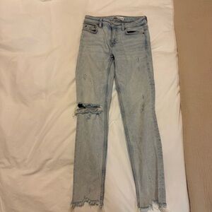 Distressed Light Blue Jeans